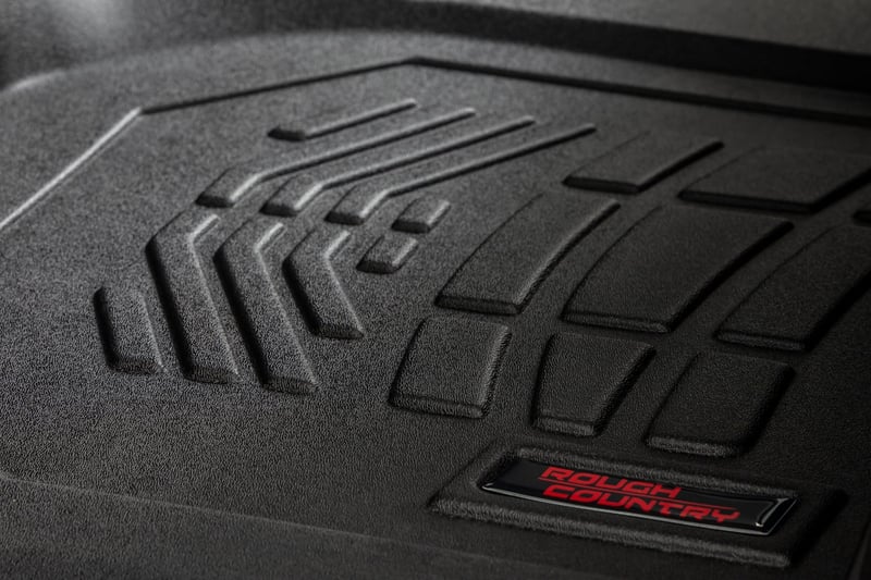 RC Sure-Fit Floor Mats | Front Over Hump | Crew | Chevy/GMC 1500/2500HD/3500HD (19-26) (manufacturer page)