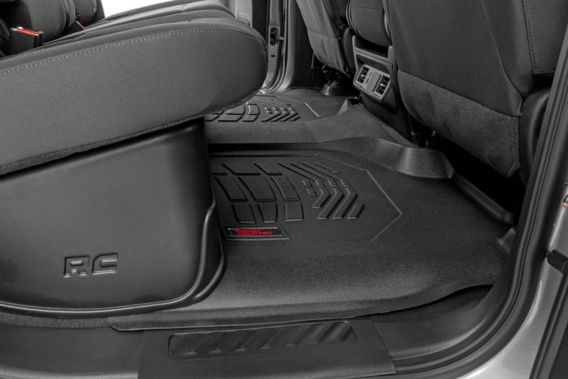 RC Sure-Fit Floor Mats | Front Over Hump | Crew | Chevy/GMC 1500/2500HD/3500HD (19-26) (manufacturer page)