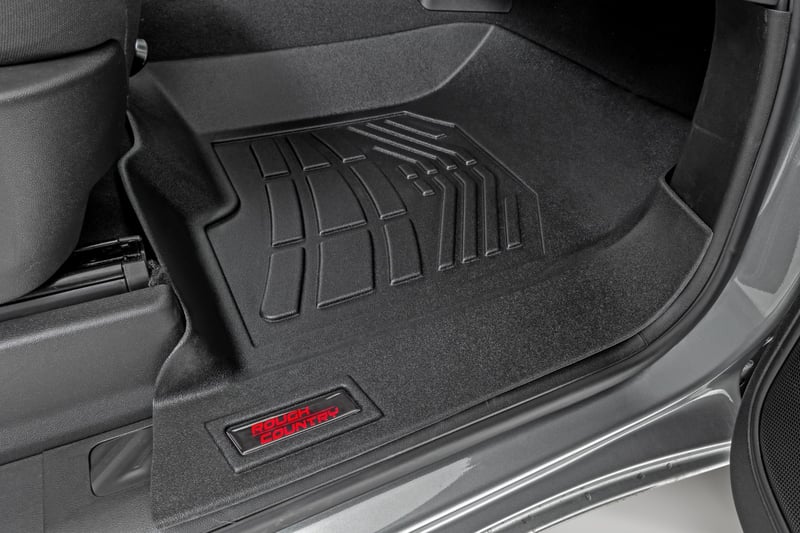 RC Sure-Fit Floor Mats | Front Over Hump | Crew | Chevy/GMC 1500/2500HD/3500HD (19-26) (manufacturer page)