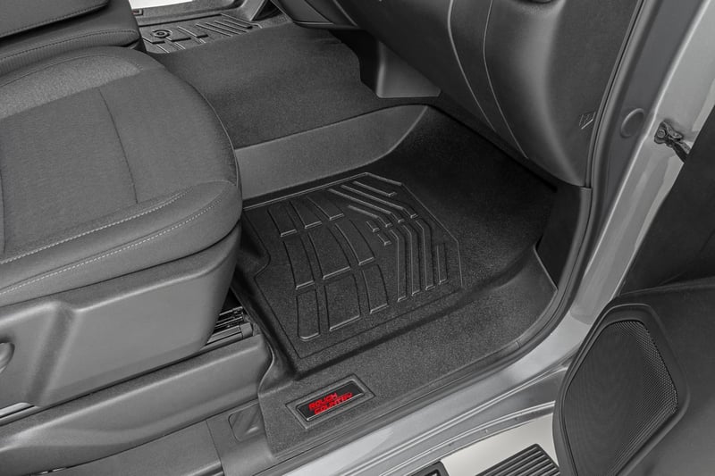 RC Sure-Fit Floor Mats | Front Over Hump | Crew | Chevy/GMC 1500/2500HD/3500HD (19-26) (manufacturer page)