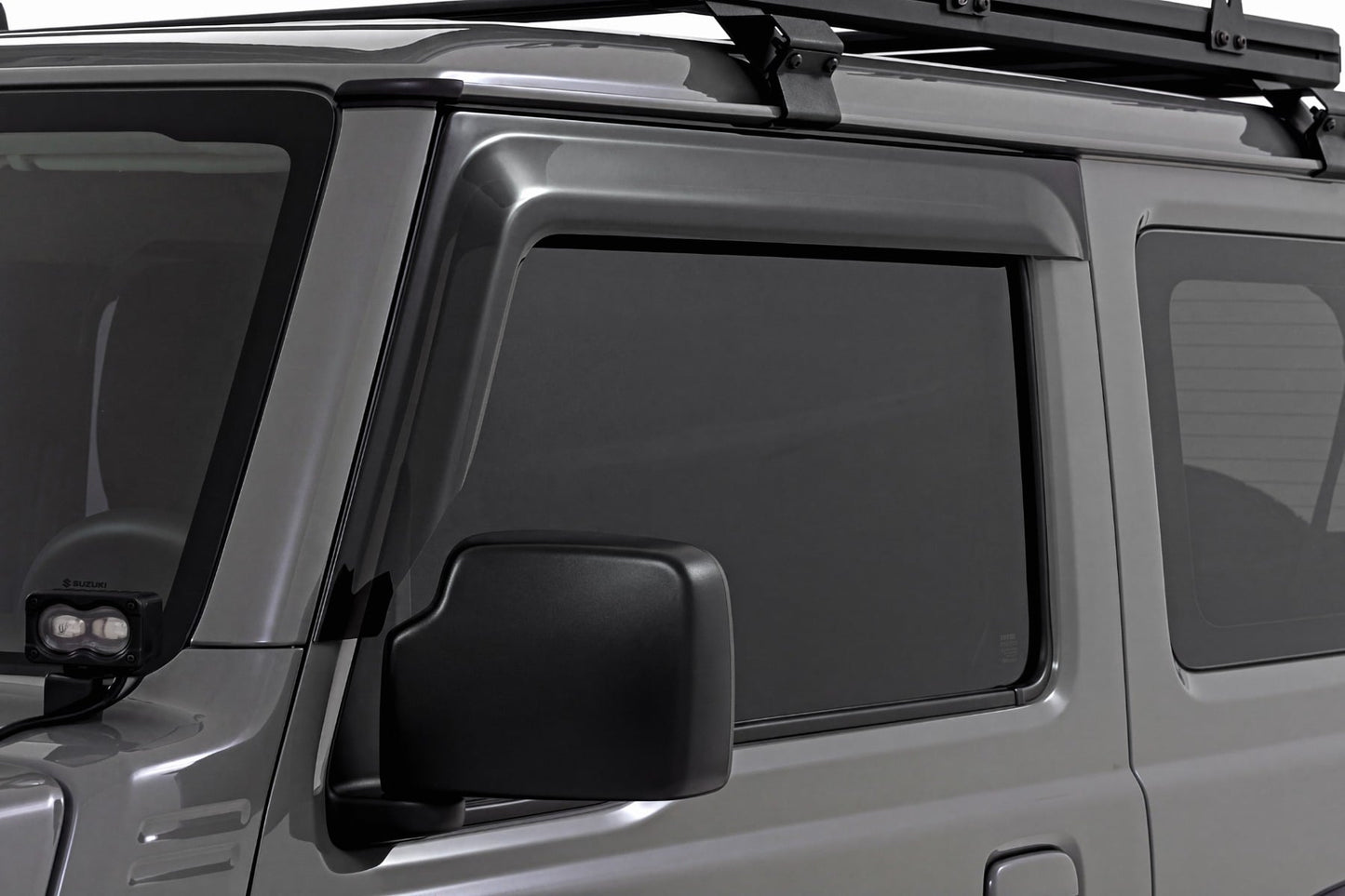 Impact Resistant Side Window Deflectors | Tape On Rain Guard | Suzuki Jimny 3 Door (2018-2026) - Misc 25% (Image 1 of 5)