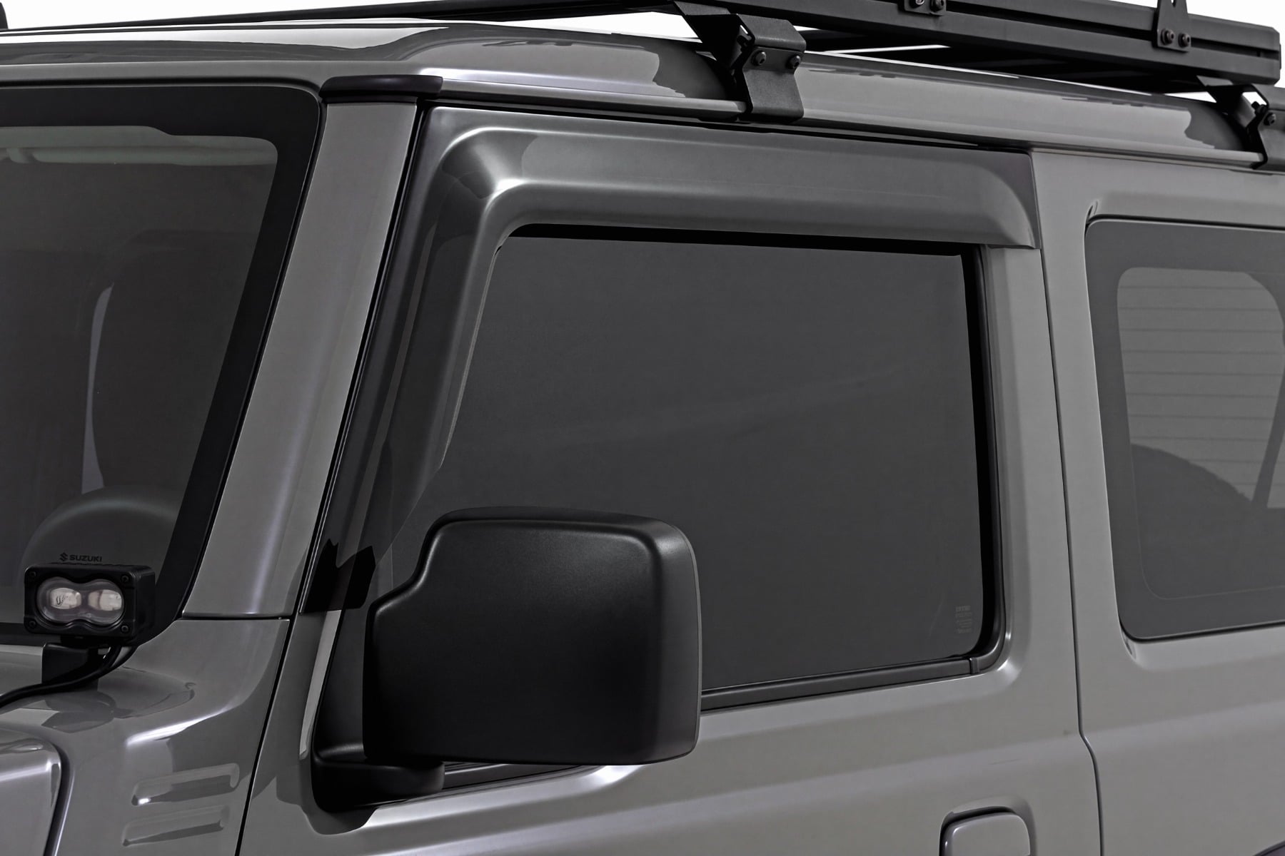 Impact Resistant Side Window Deflectors | Tape On Rain Guard | Suzuki Jimny 3 Door (2018-2026) - Misc 25% (Image 1 of 5)