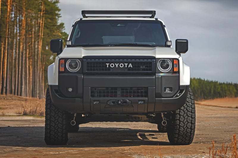 RC FXS Hidden Winch Mount | White SAE | Fog | Toyota Land Cruiser 4WD (24-26) (manufacturer page)